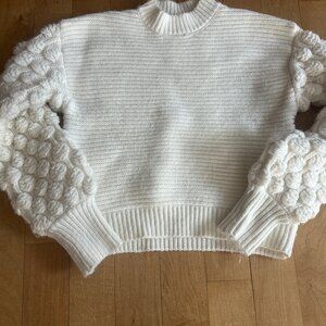 Popcorn sleeve wool sweater